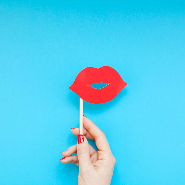 istock Red paper photo booth props female lips 1030751720