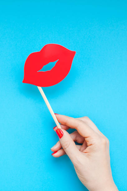 istock Red paper photo booth props female lips 1030751776