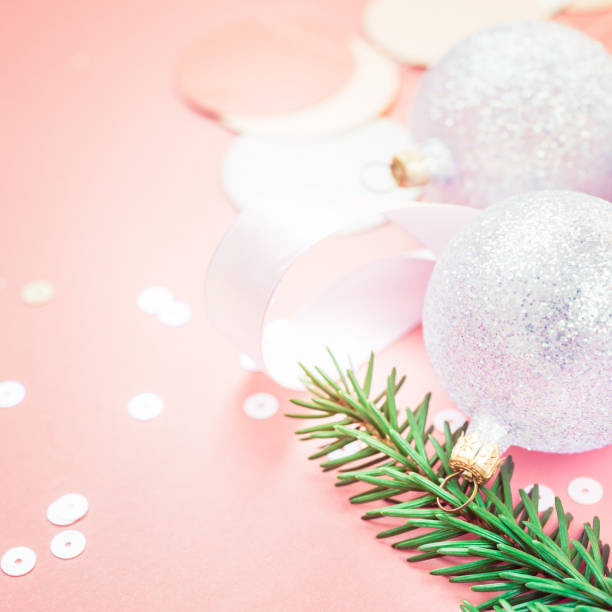 istock Christmas pearl decoration balls pink background 1030752202