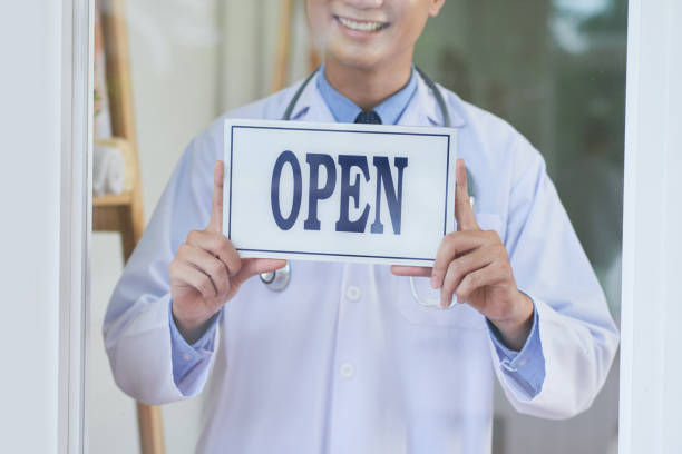 istock Crop doctor with open sign 1030755694