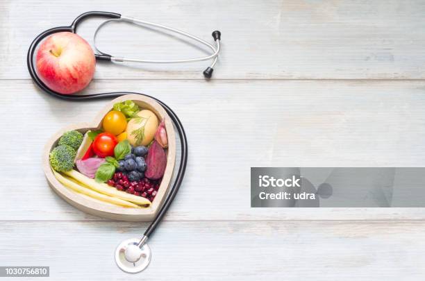 Healthy Food In Heart Diet Concept With Stethoscope Stock Photo - Download Image Now