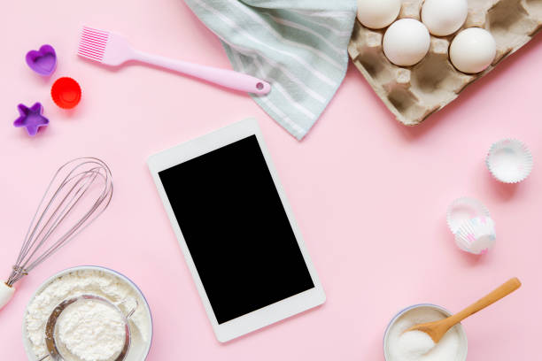 istock Dessert ingredients and utensils with Digital Tablet 1030760240