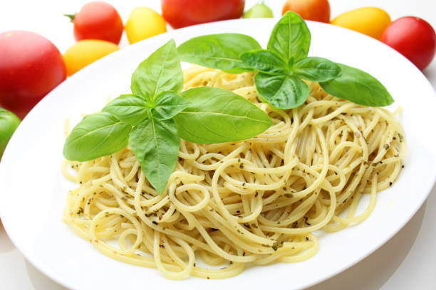 istock Paste spaghetti with homemade pesto sauce 1030766356