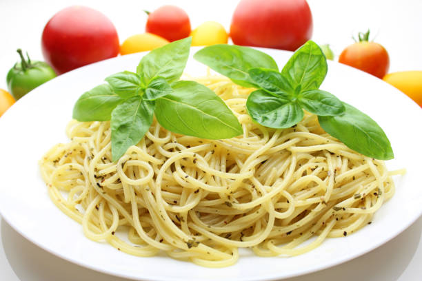 istock Paste spaghetti with homemade pesto sauce 1030766370