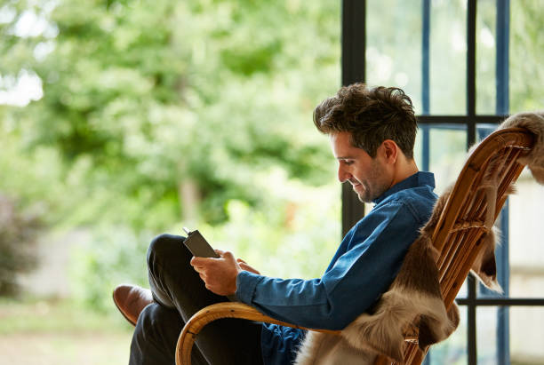 istock Just him and his social media feed 1030769862