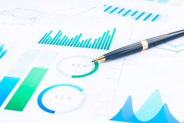 istock Close up a Pen on Business Graphs finance document. 1030770264