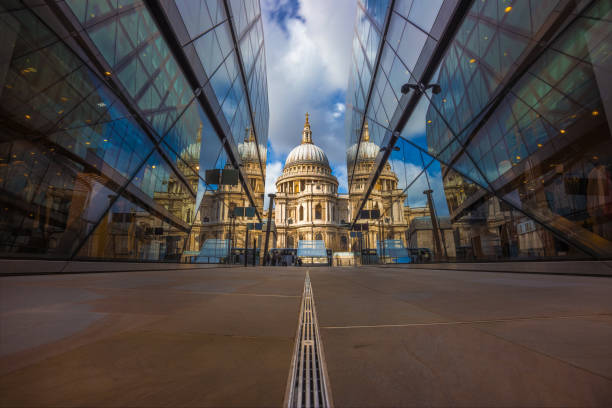 London, England - Beautiful St.Paul's Cathedral reflected in glass windows in the morning sunlight stock photo
