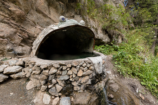 Small hot springs in the valley of Altyn-Arashan in Kyrgyzstan. The water is collected in small pools.