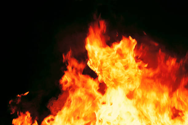 istock Beautiful abstract flame of fire on black background 1030774900
