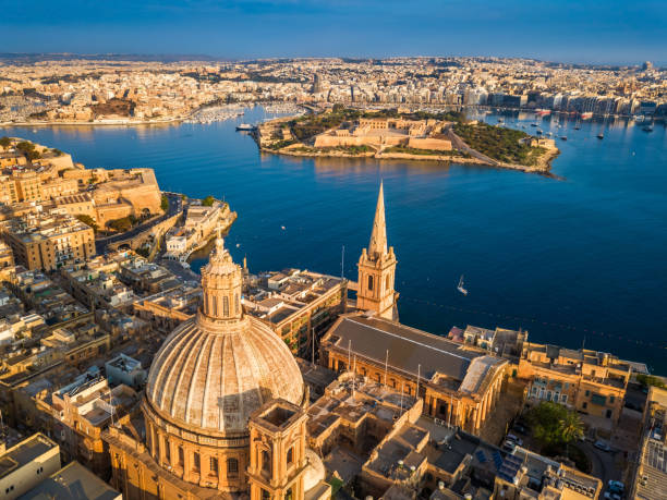 Valletta, Malta - Aerial view of Our Lady of Mount Carmel church, St.Paul's Cathedral and Manoel Island stock photo
