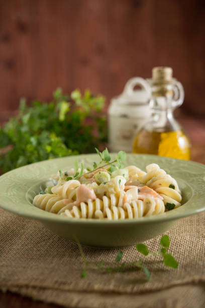 istock pasta with creamy salmon sauce 1030780890