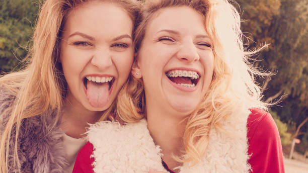 istock Two crazy women having fun outdoor 1030782852