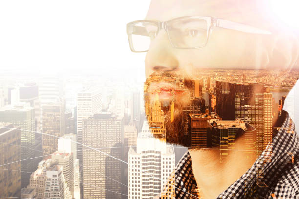 istock businessman and city view 1030786918