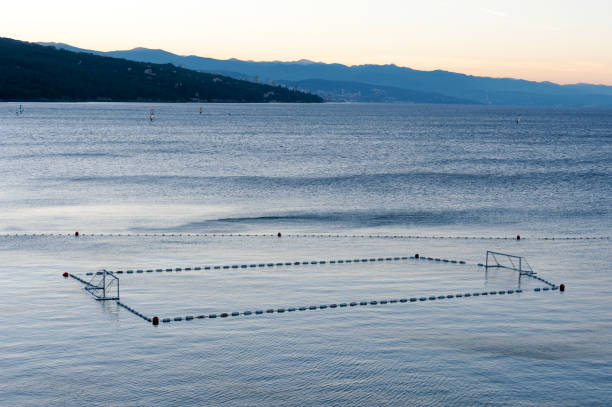 istock Before sunrise on the beach, early morning seaside activity at Mediterranean 1030798428