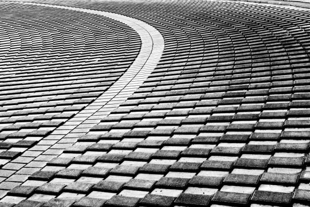 istock part of the road with concrete blocks 1030798888