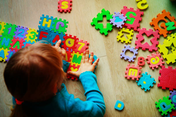 istock little girl learning numbers, education concept, education 1030799222
