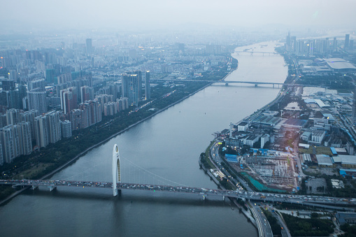 Panorama of Guangzhou at dusk - Liede bridge and Pearl River.