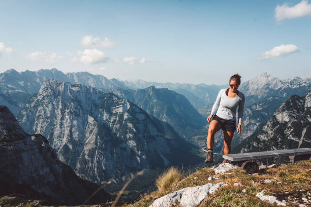 istock Young woman exploring the mountains 1030806606