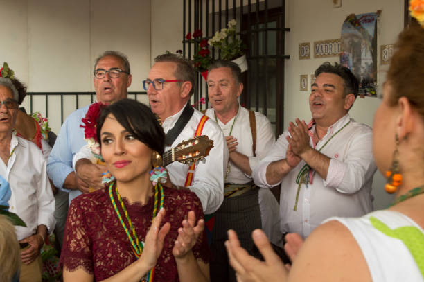 dos mujeres bailando durante la romeria del rocio, el rocio, españa. - journey entertainment group people traveling journey elegance fotografías e imágenes de stock