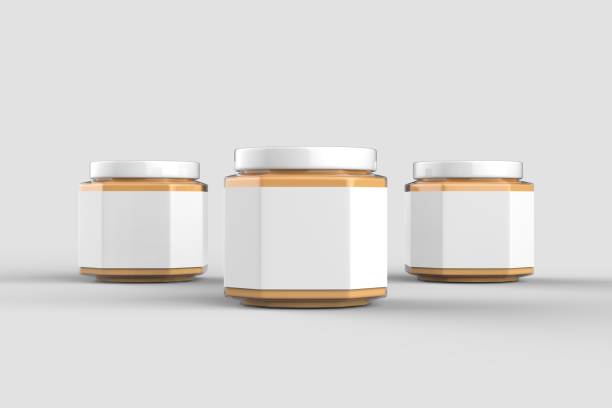 istock Peanut butter in jar mock up isolated on soft gray background with white label. Small size. 3D illustration 1030807438