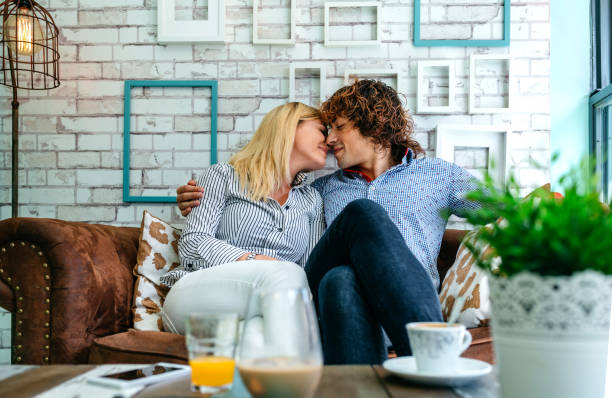 istock Couple kissing on a sofa 1030808134