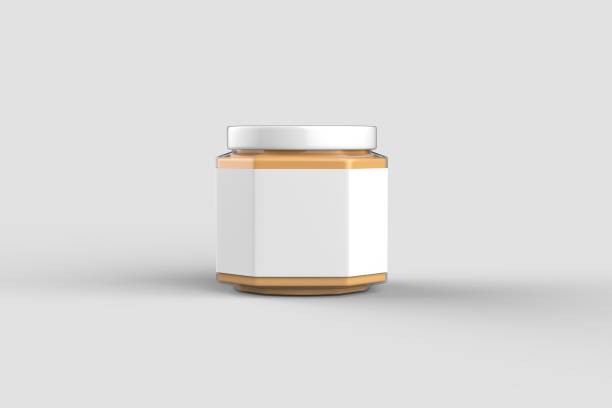 istock Peanut butter in jar mock up isolated on soft gray background with white label. Small size. 3D illustration 1030809152