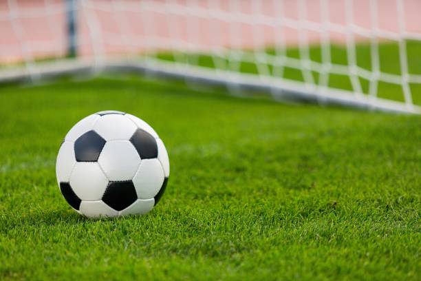 Soccer. Closeup of a Soccer Ball and Goalpost soccer ball photos stock pictures, royalty-free photos & images