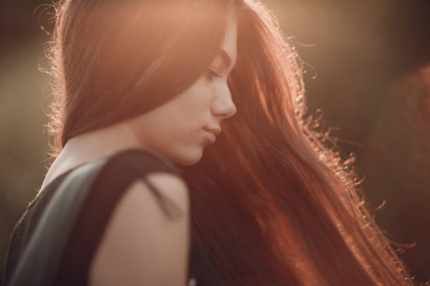 istock Beautiful young lady with beautiful long hair 1030812448