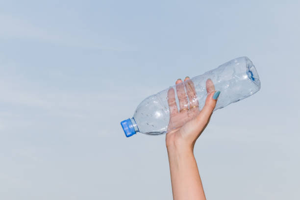 istock Hand hold bottle of drinking water 1030822440