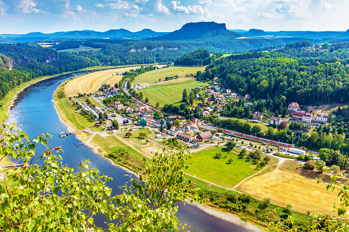 Scenic summer aerial panorama of Elbe River and Rathen, Saxony, Germany viewed from the Bastei rock formation