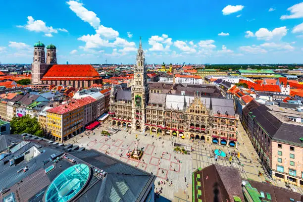 Scenic summer aerial view of the ancient medieval gothic architecture City Hall building at the Marienplatz Market Square in Munich, Bavaria, Germany