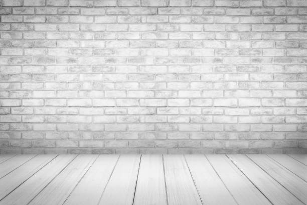 istock white and gray wood floor with brick wall background 1030832754