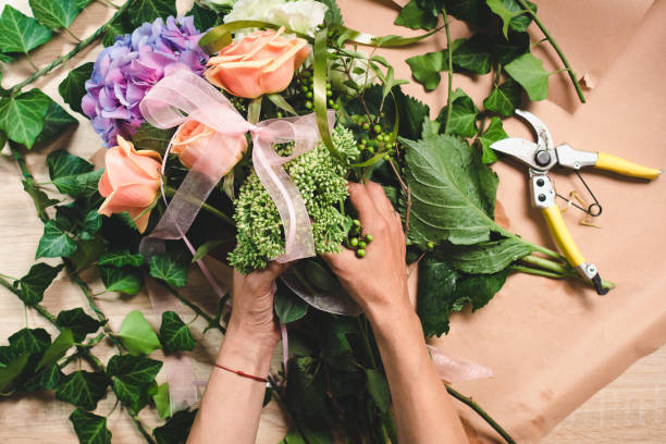 istock Florist making flower arrangement 1030835406