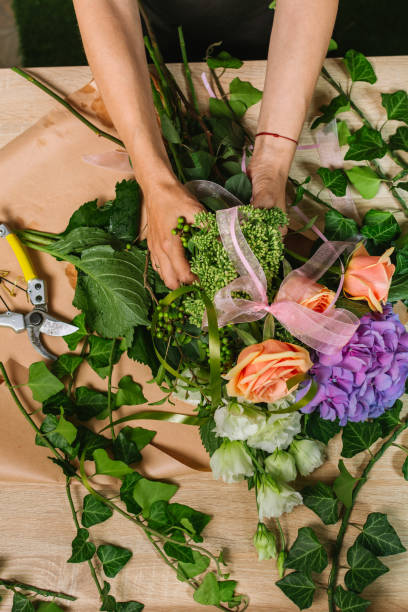 istock Florist making flower arrangement 1030835626