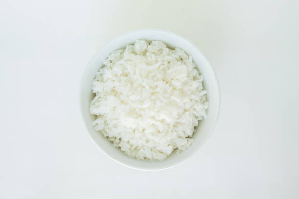 basmati branco tigela de arroz natural alimentos cozidos - clipping path rice white rice basmati rice - fotografias e filmes do acervo