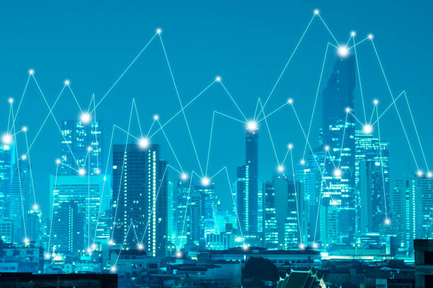 istock Connecting Dots Over Illuminated Modern Buildings In City 1030837726