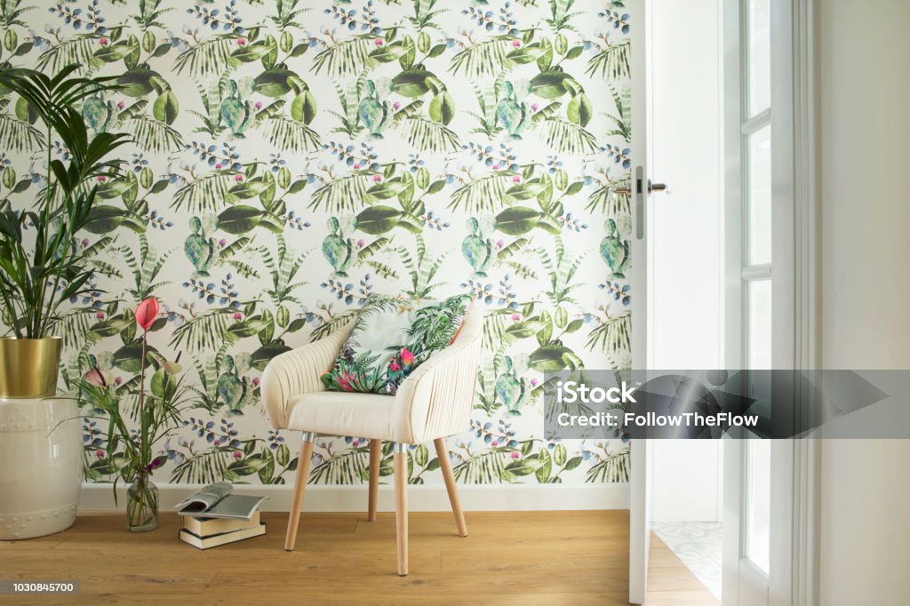 Lovely and bright space to read books or to studdy interior magazines. Stylish and cozy living room- modern interior composition. Indoors Stock Photo