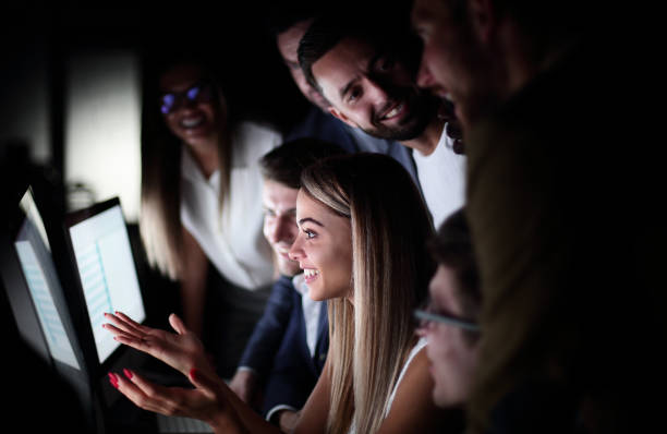 istock close up.the business team is discussing something by looking at the computer screen 1030847288