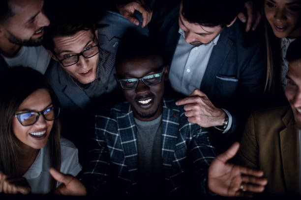 istock close up.a successful business team looks at the computer screen with passion 1030849490