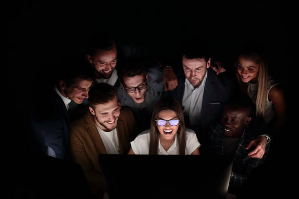 istock close up. young business team working overtime 1030849564