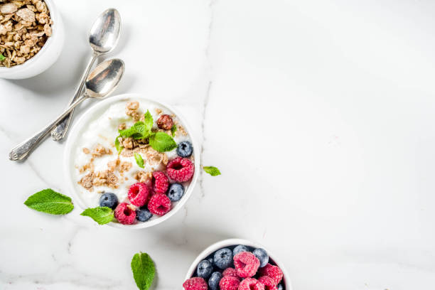 istock Yogurt with granola and berries 1030850938