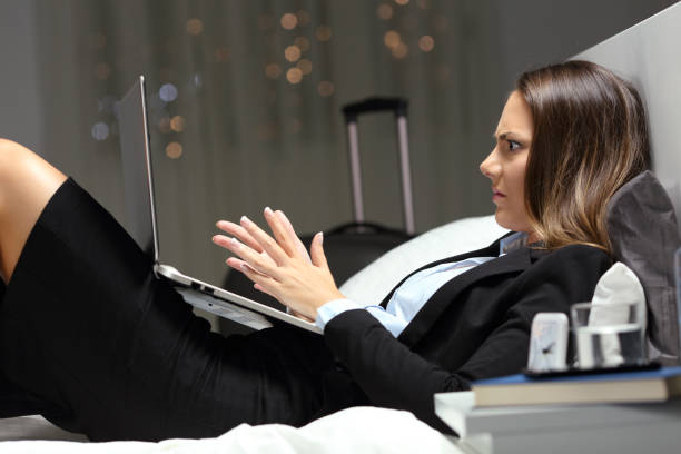 istock Angry executive working late hours during business travel 1030852472