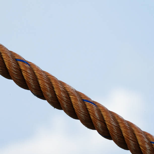 istock Rope texture thread cord hemp closeup against sky background. 1030853712