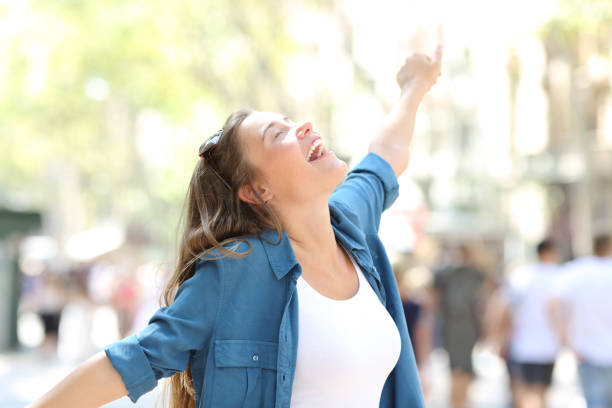 istock Happy spontaneus woman stretching arms 1030854642