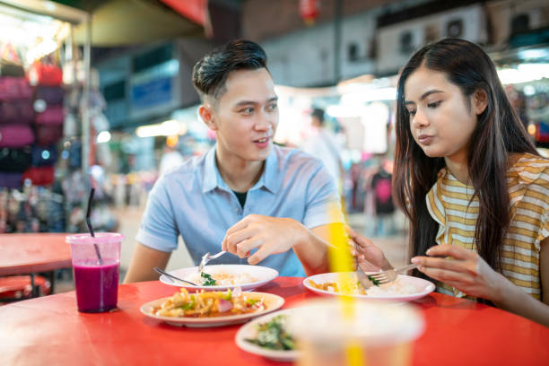 istock Trying New Food Together 1030862372