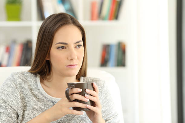 istock Sad woman wondering looking away 1030865674
