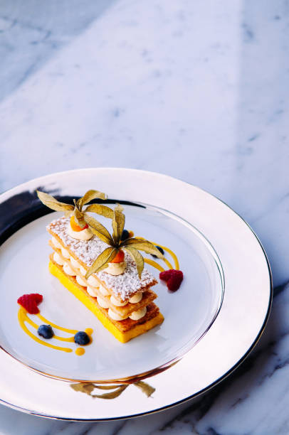 istock Mango berries Millefeuilles French puff pastry on elegant plate 1030887186