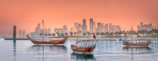 Traditional Arabic Dhow boats in Doha harbour stock photo