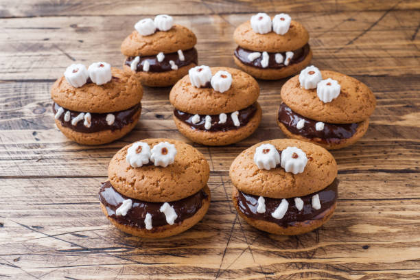 istock Cookies with chocolate paste in the form of monsters for Halloween 1030911140