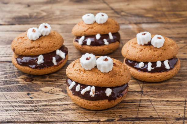 istock Cookies with chocolate paste in the form of monsters for Halloween 1030911872